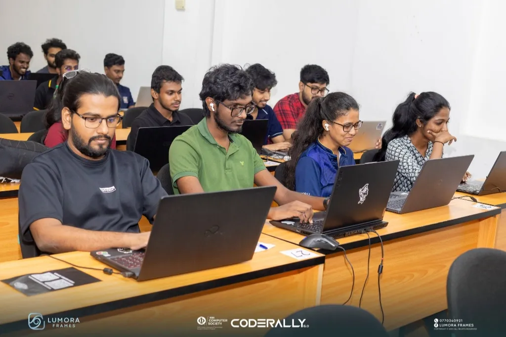 Hackathon participants coding